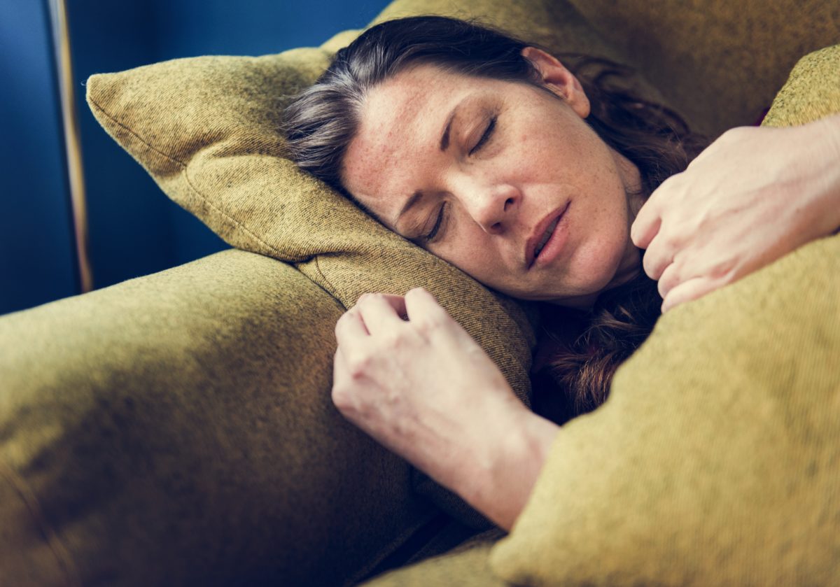 woman-sick-on-the-sofa-VKMP8GZ-1200x839.jpg