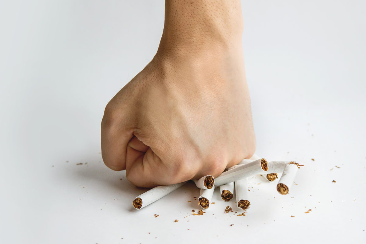 bigstock-Men-Hand-Crushed-Some-Cigarett-212203783-1200x800.jpg